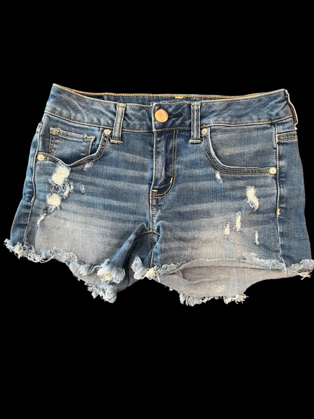 AEO Super  Stretch Midi, Distressed Medium Wash Blue Jeans, Raw Hems Size 4.